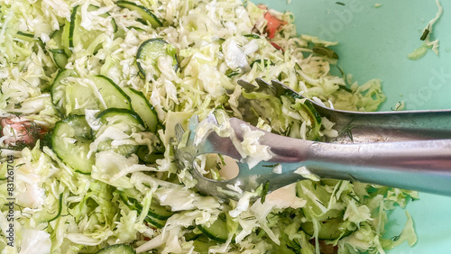 Healthy food, cabbage and greens salad photo