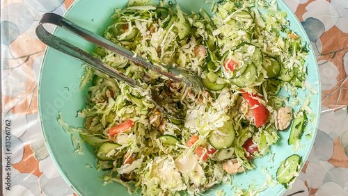 Healthy food, cabbage and greens salad photo