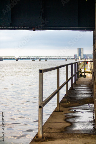 small walkway under the bridge