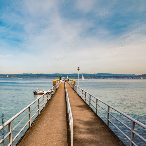 Beautiful spring view with reflections and a perspective view of a kay at Mainau island, Lake Bodensee, Baden-Württemberg, Germany