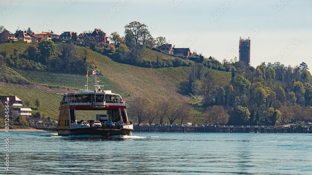 Naklejka premium Beautiful spring view with a car ferry and reflections near Meersburg, Lake Bodensee, Baden-Württemberg, Germany