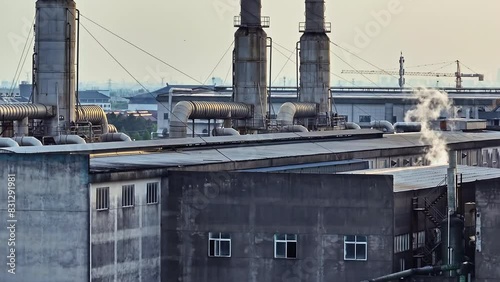 Wallpaper Mural Industrial chimneys with thick smoke at sunset Torontodigital.ca