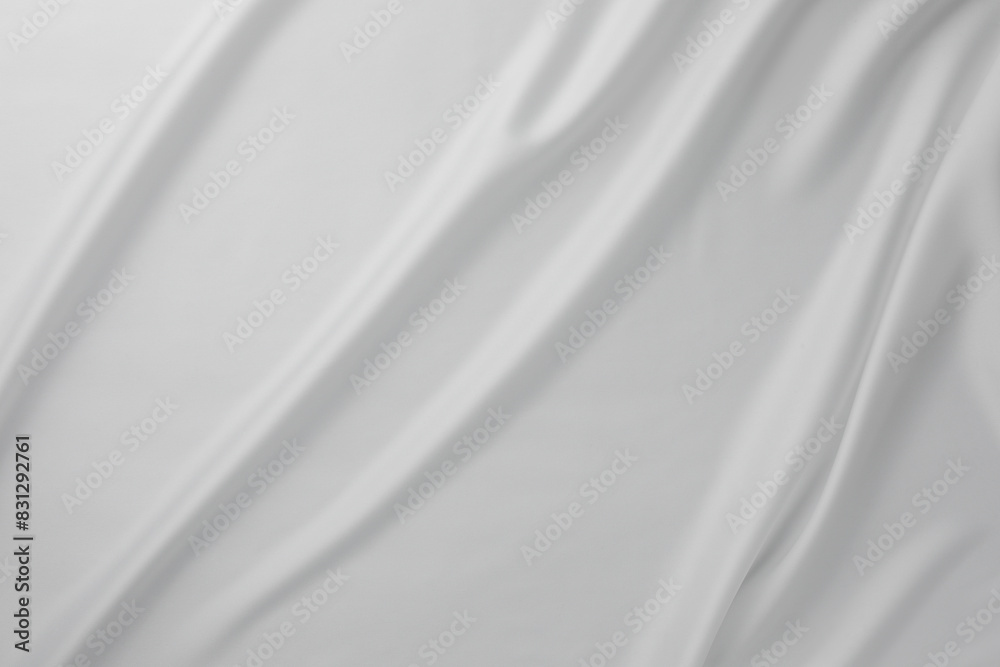 Fototapeta premium Texture of crumpled white silk fabric as background, top view
