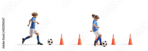 Boy and girl running with footballs between cone obstacles