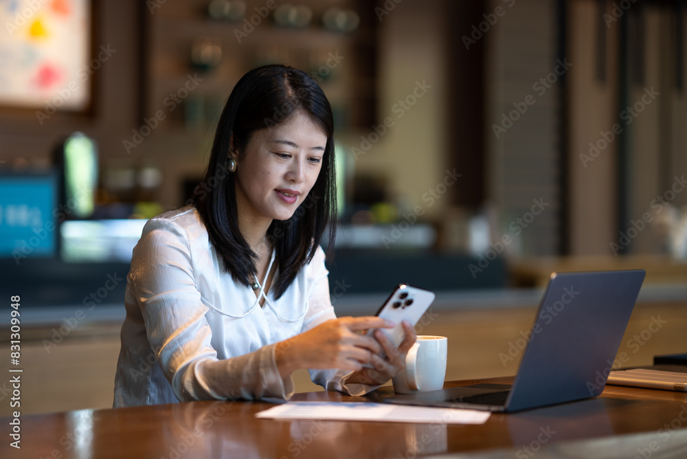 business person working with mobile phone and laptop business person working with mobile phone and laptop