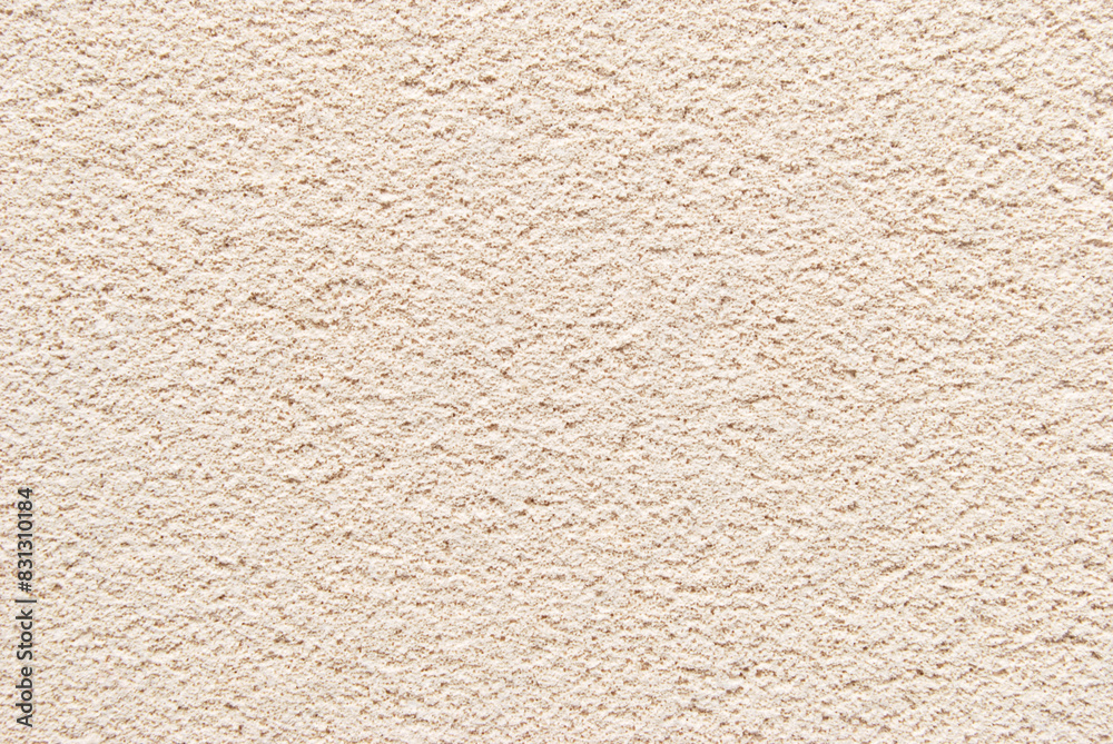 Beige porous plastered wall background, plastered texture Beige porous plastered wall background, plastered texture