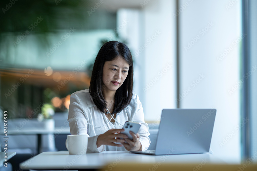 business person working with mobile phone and laptop business person working with mobile phone and laptop