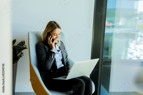 Businesswoman in modern off...