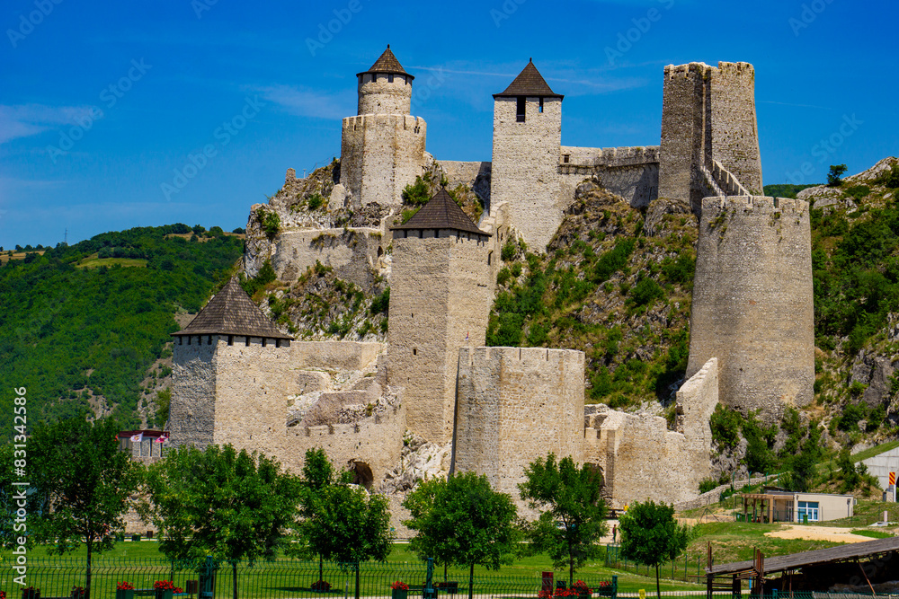 Majestic medieval Golubac fortress overlooking the Danube river in Serbia on a sunny afternoon Majestic medieval Golubac fortress overlooking the Danube river in Serbia on a sunny afternoon