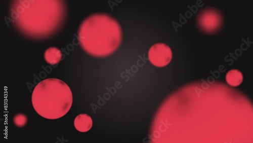 Animated 3d abstract red spheres moving on a black background. Motion design geometric render loop texture pattern with spheres moving in a focus. photo
