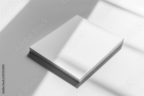 simple notepad with white paper, placed on a white background, with natural shadows that accentuate its texture and thickness.
Empty notebook ready to be filled. AI generated