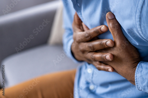 Observing an individual with an intense grip on their chest can indicate heart problems or severe stress  necessitating immediate medical attention for potential cardiac issues