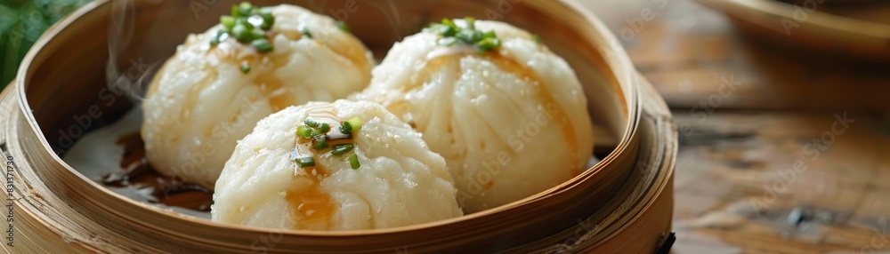 A steaming basket of fluffy steamed buns filled with savory pork filling and drizzled with a sweet soy sauce glaze. A steaming basket of fluffy steamed buns filled with savory pork filling and drizzled with a sweet soy sauce glaze.