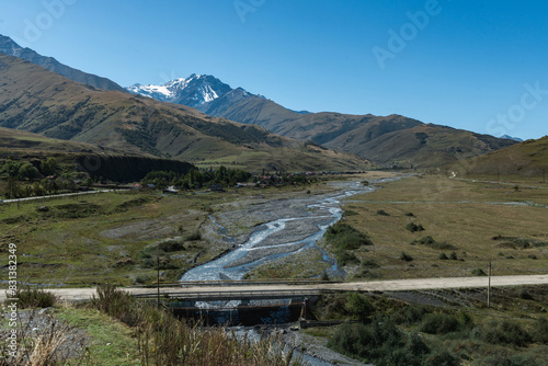 View from Necropolis near settlement Dargavs. Surroundings of Dargavs Village: City of the Dead. North Ossetia - Alania Republic, Russia. photo