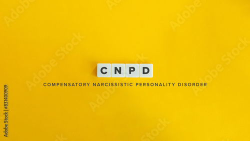 CNPD, Compensatory Narcissistic Personality Disorder. Text on Block Letter Tiles and Icon on Flat Background. Minimalist Aesthetics. photo