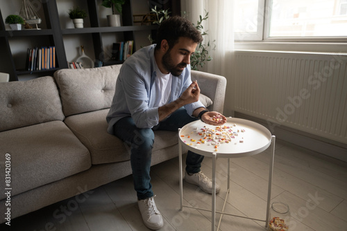 Man taking medicine. 