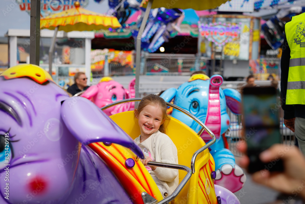 Child on fair ride, filmed on cell phone Child on fair ride, filmed on cell phone
