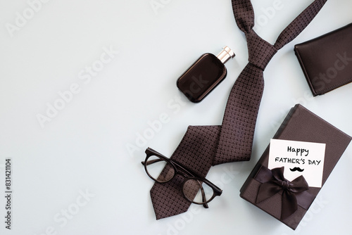 Flat lay with men's accessories and happy father's day greeting card design