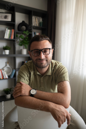 man sitting on couch