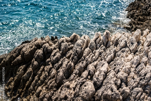 Rocky Coast of Mediterranean Sea in Croatia during summer season photo