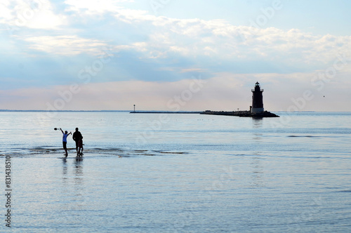 Family in front of Cape Henlopen Lighthouse