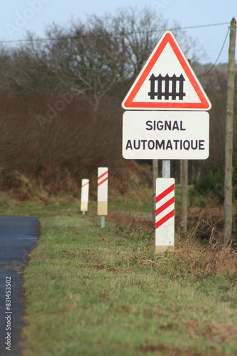 Fotografie Level crossing warning sign in France - Passage à niveau