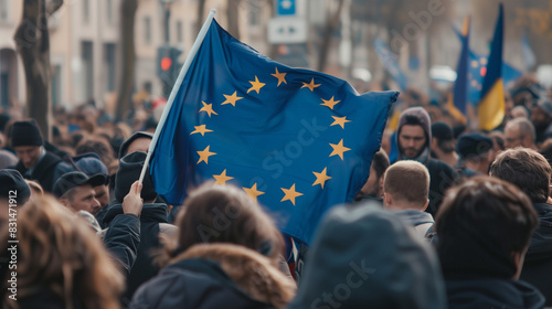 People Protesting with EU Flags on City Streets photo