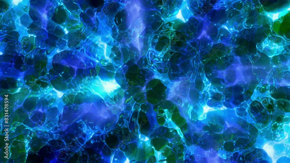 A motion background of abstract caustic and liquid effects continually morphing a moving with shimmering detail. A motion background of abstract caustic and liquid effects continually morphing a moving with shimmering detail.