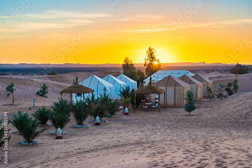 Luxury tent camp at Erg Chebbi Sahara desert at sunrise near Merzouga town, Morocco, North Africa