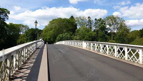 View of historical Whitchurch Bridge, toll bridge, over the River Thames linking Pangbourne in Berkshire, and Whitchurch-on-Thames in Oxfordshire, England UK photo