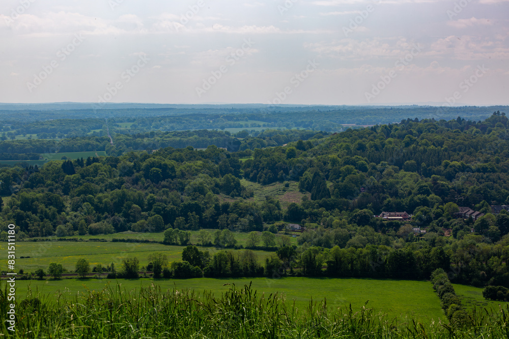 Landscape view of the English countryside on a warm spring day, Image shows a beautiful countryside view from the top of Box hill on the outskirts of London Landscape view of the English countryside on a warm spring day, Image shows a beautiful countryside view from the top of Box hill on the outskirts of London