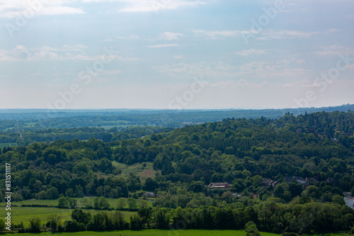 Landscape view of the English countryside on a warm spring day, Image shows a beautiful countryside view from the top of Box hill on the outskirts of London photo