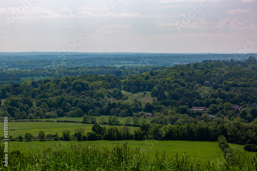 Landscape view of the English countryside on a warm spring day, Image shows a beautiful countryside view from the top of Box hill on the outskirts of London