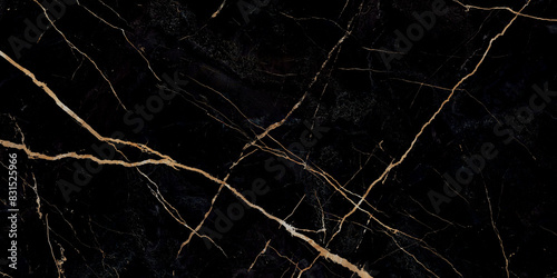 Black marble texture as background with golden veins