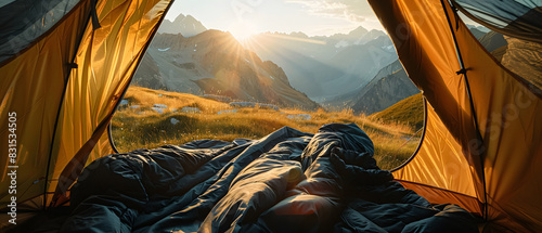 view from inside a tent with a beautiful view of the mountains at dawn photo