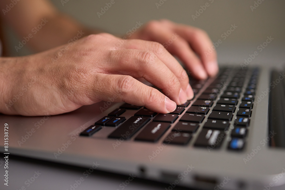 Hands typing on a mechanical keyboard in a workspace, enhancing productivity and focus Hands typing on a mechanical keyboard in a workspace, enhancing productivity and focus