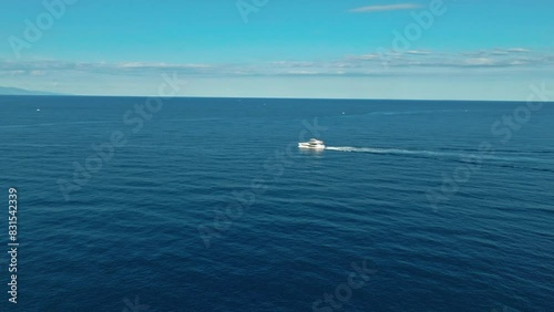 Aerial drone video. Blue Mediterranean Sea. Yacht. Breathtaking view.Cap d'Antibes