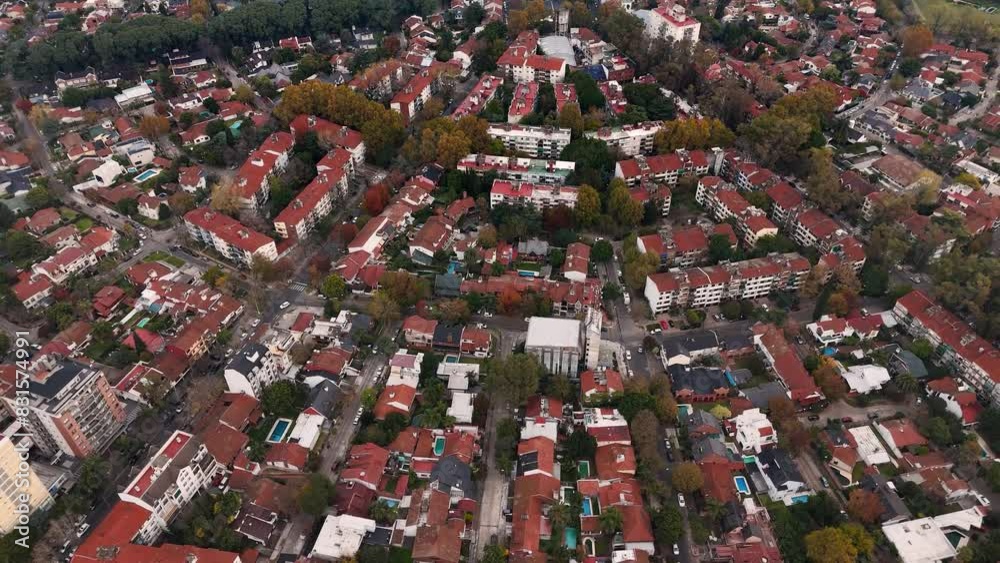 Aerial view of residential district in the suburbs of Buenos Aires, Argentina. Drone flies over the neighborhood backwards Aerial view of residential district in the suburbs of Buenos Aires, Argentina. Drone flies over the neighborhood backwards