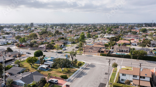 Paramount, California, USA - May 2, 2021: Afternoon sun shines on a neighborhood near downtown Paramount.