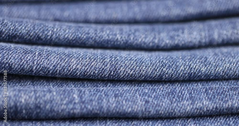 blue denim fabric for sewing clothes, new denim fabric from clothing jeans close-up blue denim fabric for sewing clothes, new denim fabric from clothing jeans close-up