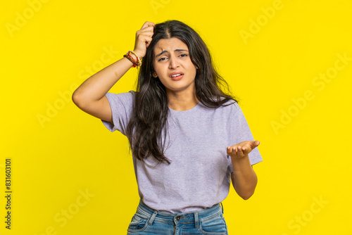 Fotografie Sad young Indian woman feeling hopelessness loneliness, nervous breakdown loses becoming surprised by lottery results bad fortune loss unlucky news