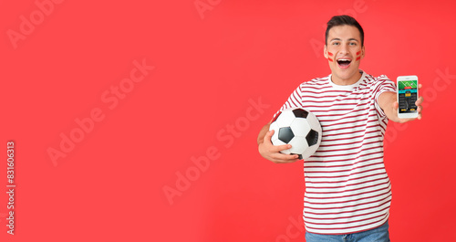 Happy man with soccer ball ...