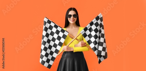 Pretty young woman holding ...