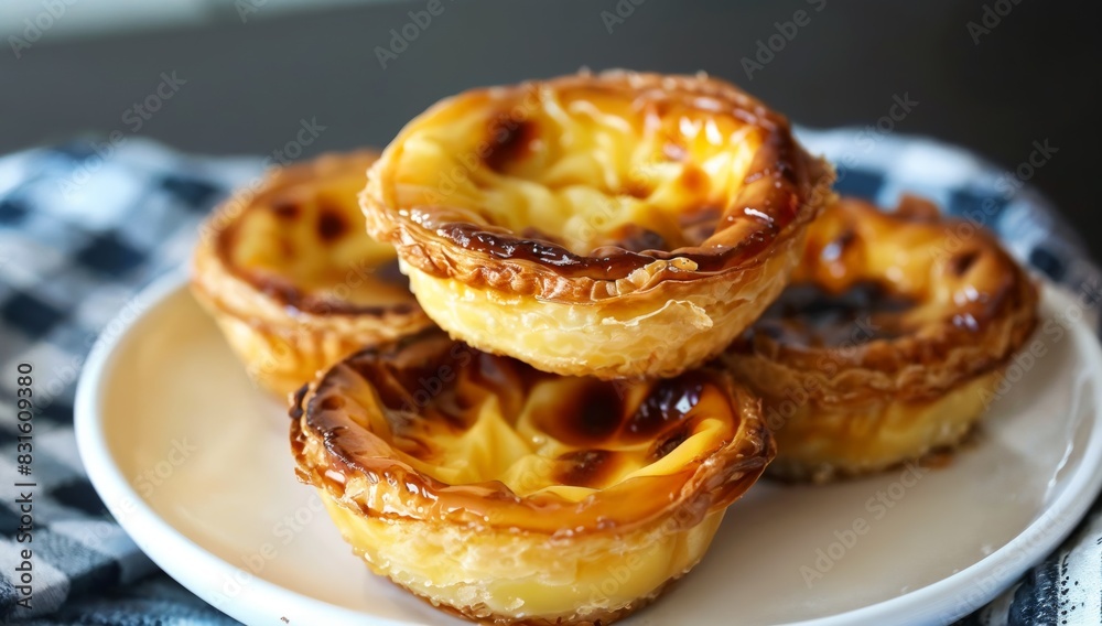 Dessert Bliss: The Perfect Moment with Pasteis de Nata on Your Plate Dessert Bliss: The Perfect Moment with Pasteis de Nata on Your Plate