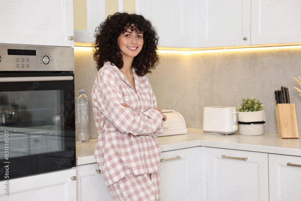 Beautiful young woman in stylish pyjama in kitchen Beautiful young woman in stylish pyjama in kitchen