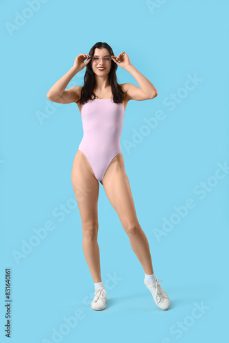 Beautiful young woman in sw...