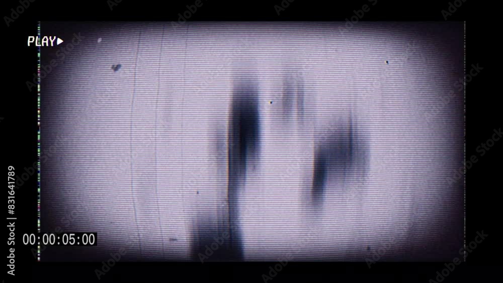 Old style video camera frame with textured images in fast motion