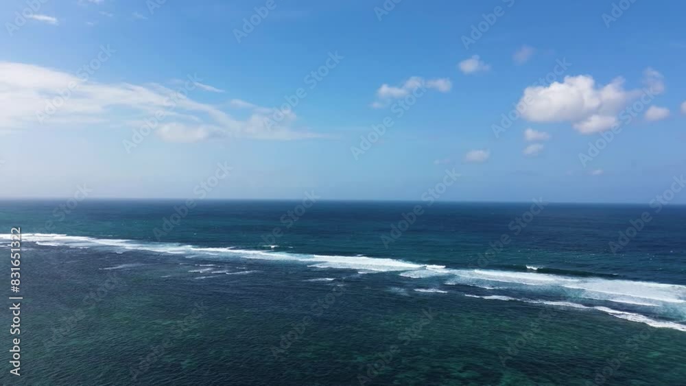 Aerial view of ocean waves in Tanah Barak beach, Bali, Indonesia Aerial view of ocean waves in Tanah Barak beach, Bali, Indonesia