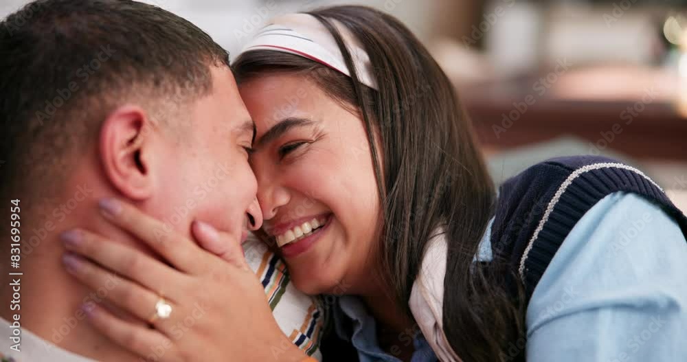 Woman, man and love with affection, smile and laughing in home for relationship, cuddle and close. Romantic, couple and cheerful as lovers in nose touch for bonding in lounge in embrace for together Woman, man and love with affection, smile and laughing in home for relationship, cuddle and close. Romantic, couple and cheerful as lovers in nose touch for bonding in lounge in embrace for together