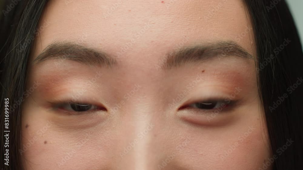 Close up dark eyes gaze Asian woman looking at camera human iris eyeball chinese korean girl open eyelid lashes good eyesight vision problem laser eye surgery female beauty model cropped face details